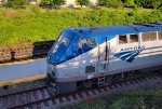 My shadow waving with AMTK 190 on the Lynchburg, Kemper Street storage track below.